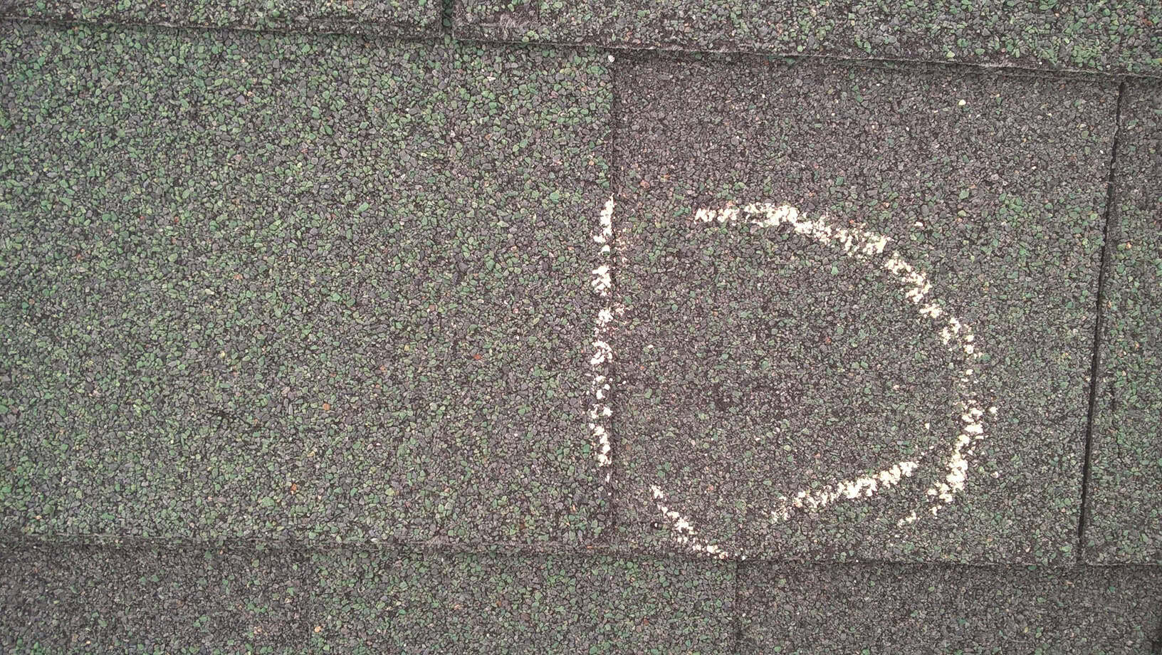 Hotel-Roof-Hail-Damage-Close-Up-Hail-Damage